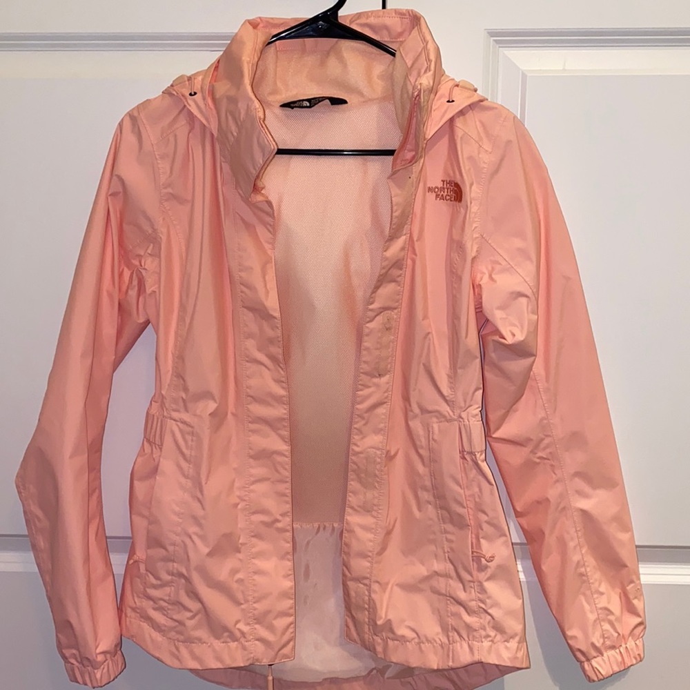 The North Face flamingo pink rain jacket.